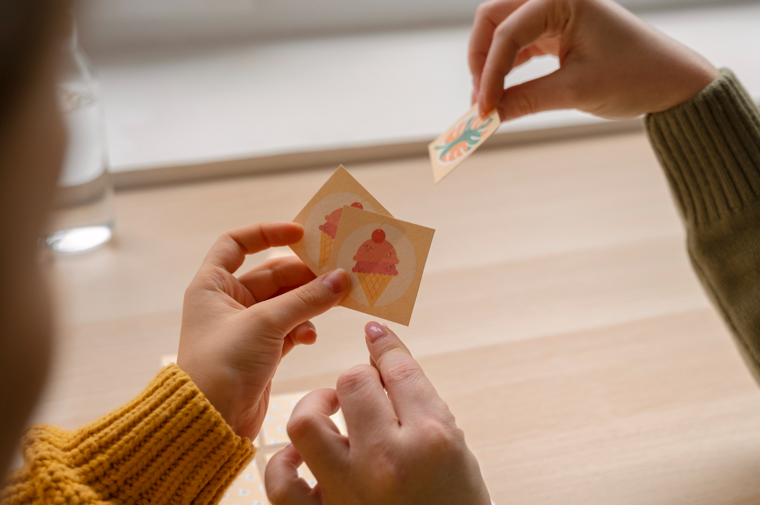 Child celebrating progress on reward chart